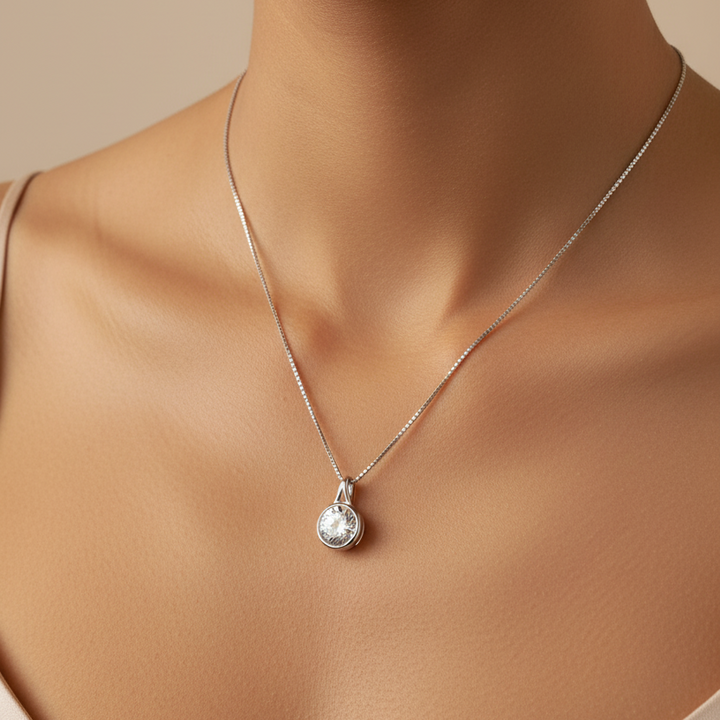 Model wearing the elegance round solitaire memorial jewellery ashes necklace