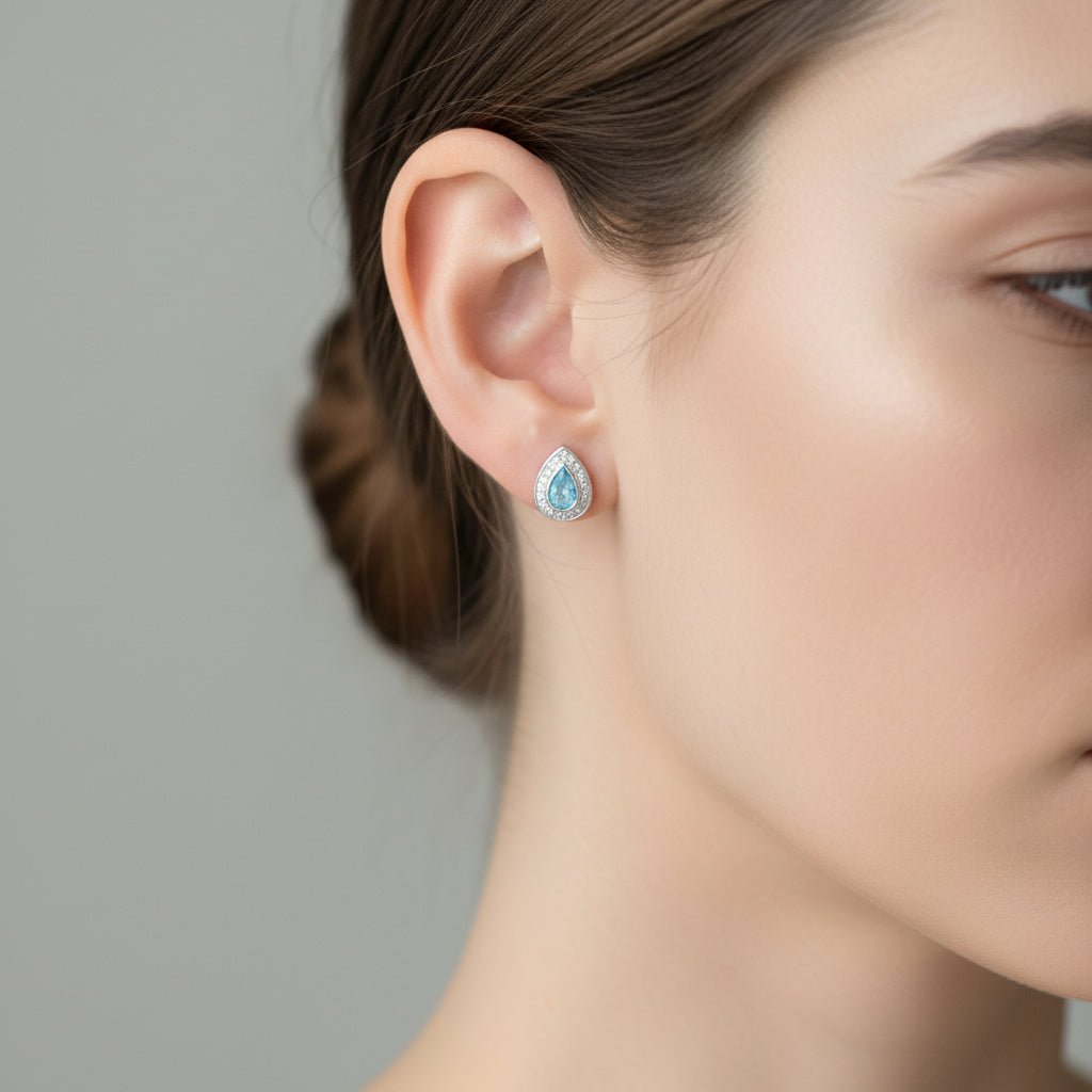 Model wears ashes memorial crystal teardrop earrings made with ashes - Nicky Robin Memorial Jewellery