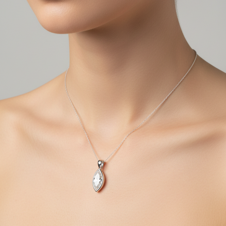 Woman wears Marquise Ashes Memorial Jewellery Elegance Necklace with secret setting on the reverse side