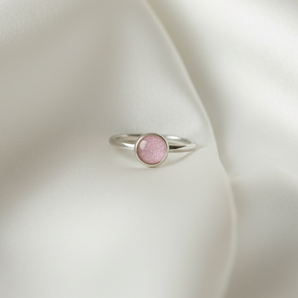 classic round memorial ashes ring on white satin
