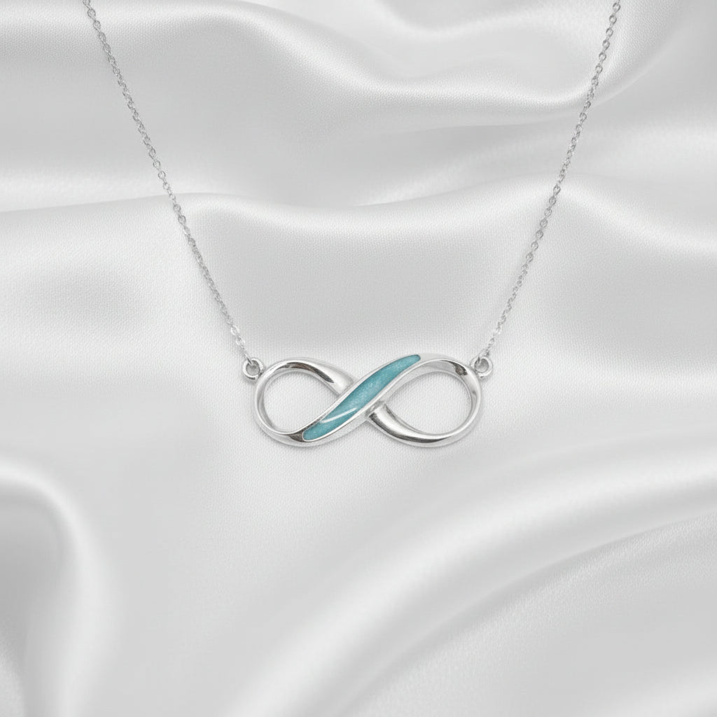 Infinity Memorial Ashes Necklace made in aqua blue resin - Nicky Robin Memorial Jewellery