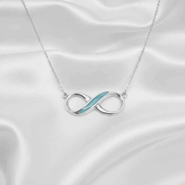 Infinity Memorial Ashes Necklace made in aqua blue resin - Nicky Robin Memorial Jewellery