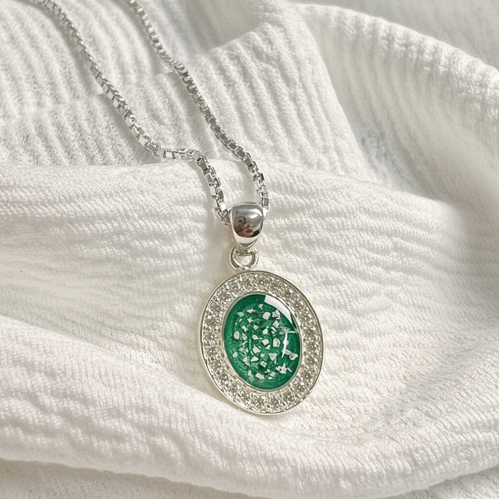 Memorial Ashes halo Cubic Zirconia (CZ) Oval Ashes Necklace made in green resin with ashes - Nicky Robin Memorial Jewellery