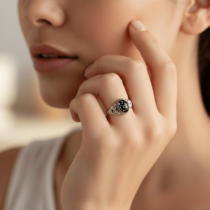 Model Wears Oval Filigree Heart Memorial Ashes Ring made in black resin - Nicky Robin Memorial Jewellery