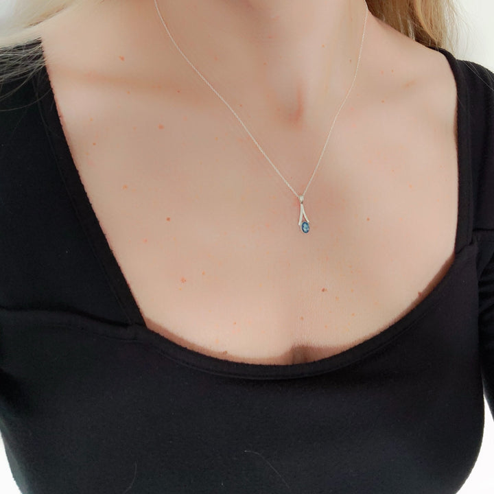Model Wears Dainty Oval Drop Ashes Necklace - Nicky Robin Memorial Jewellery